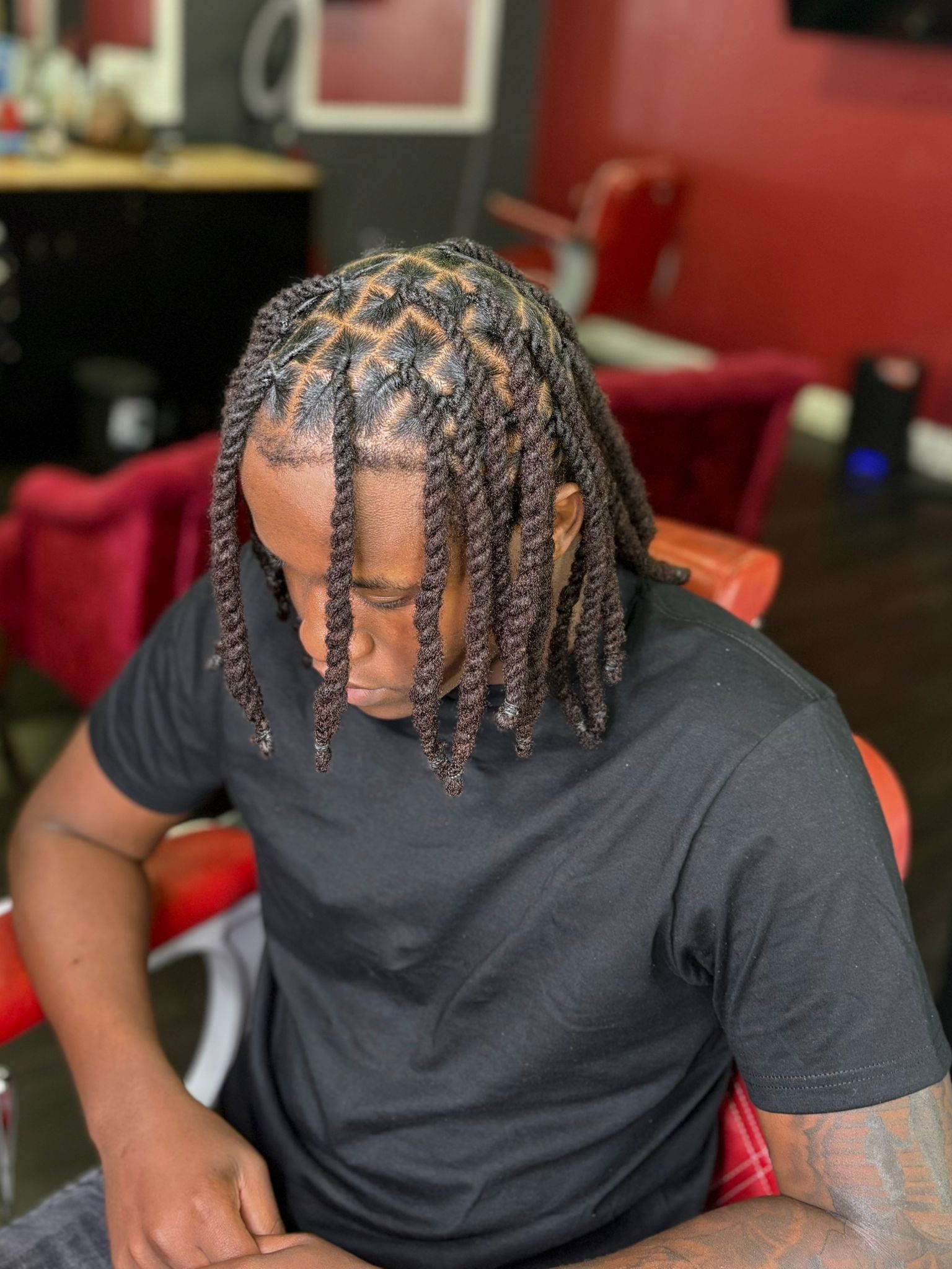 Palm-roll retwist with grid parts, top view
